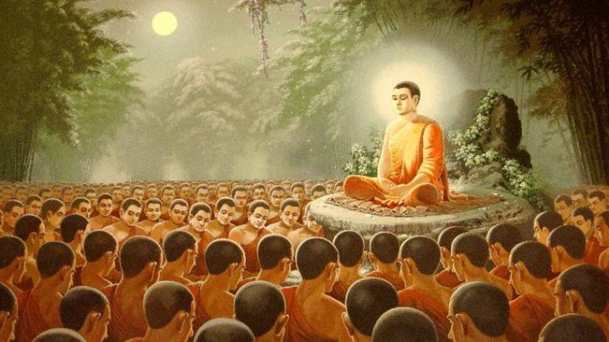 พระสงฆ์นั่งรายล้อมพระพุทธเจ้าในวันมาฆบูชา